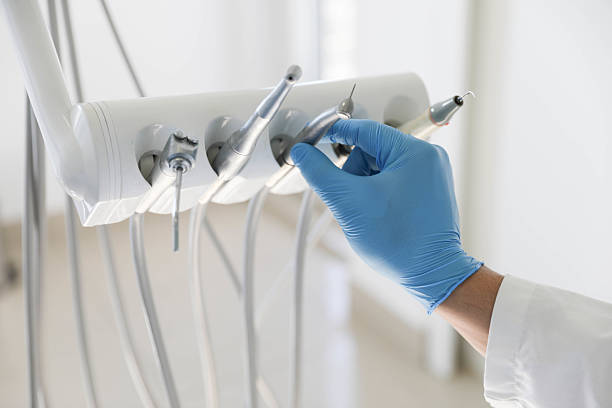 Professional Tooth Extraction technician working in Bethalto, IL